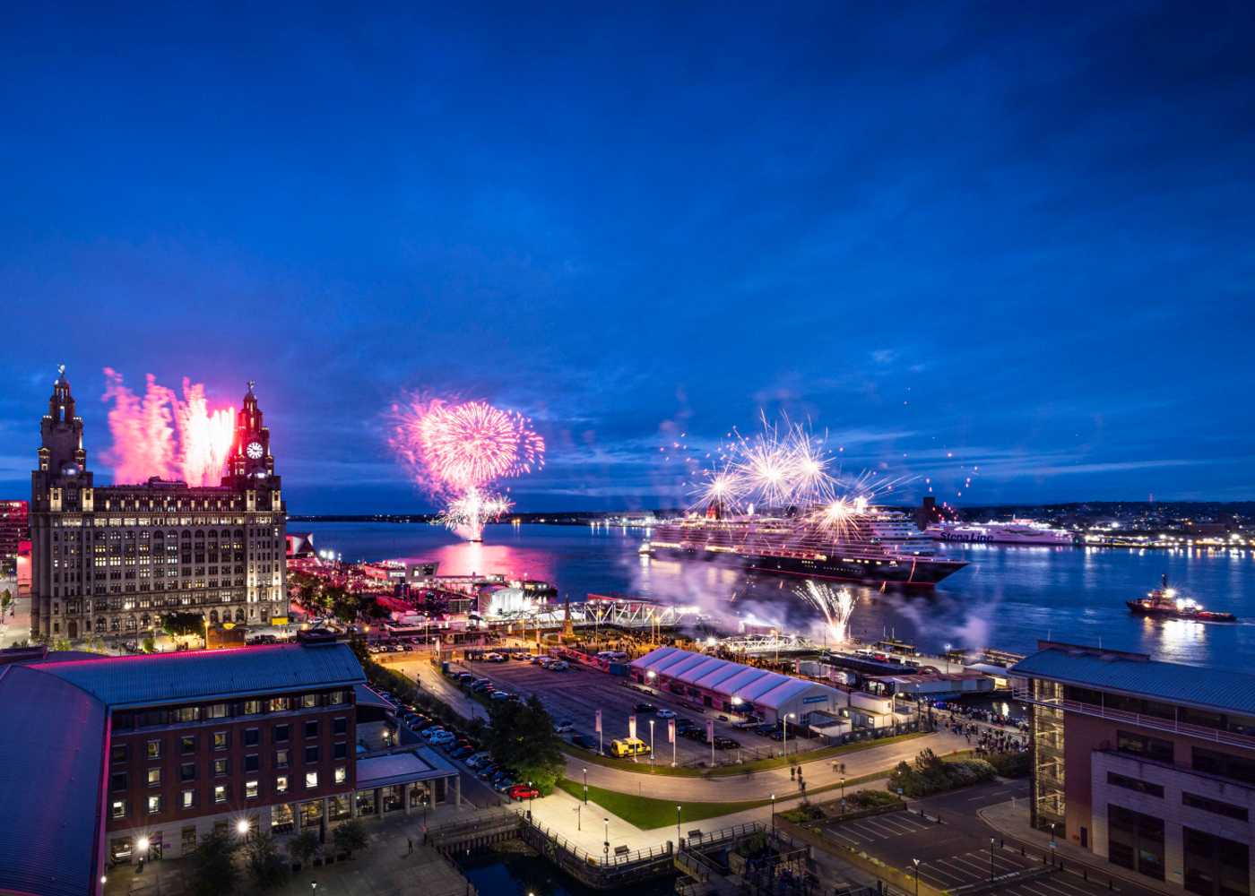 Cunard's Queen Anne on the River Mersey departing Liverpool under the cover of colourful fireworks