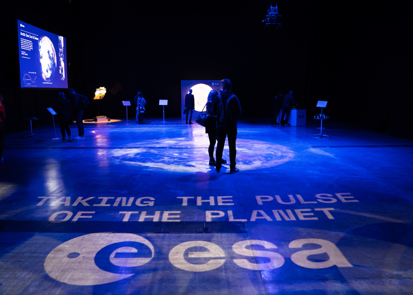 picture of a space installation with the words taking the pulse of the planet