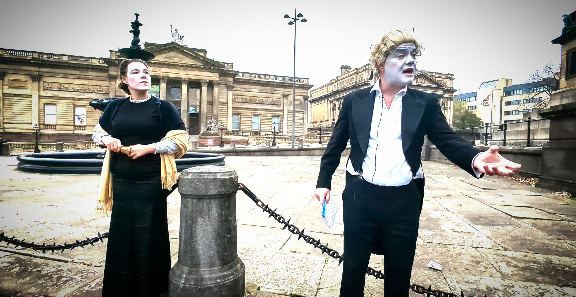 Two people performing in the street on a cloudy day