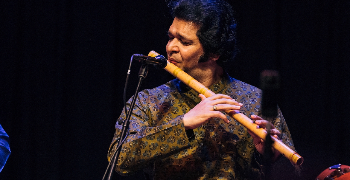 A man playing the flute