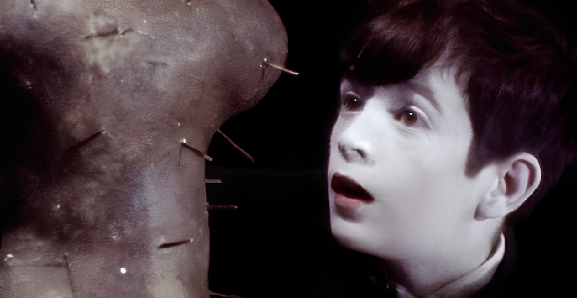 A still from a film production featuring a close-up of a young boy's face